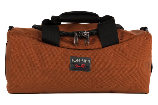 A Mini Yeoman Duffel in Burnt Orange 1050 Ballistic.